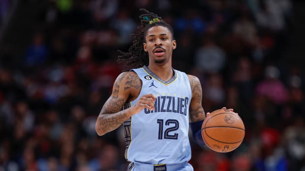 Memphis Grizzlies guard Ja Morant dribbles the basketball.